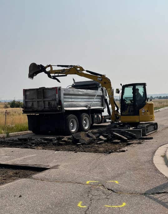 asphalt being removed from parking lot